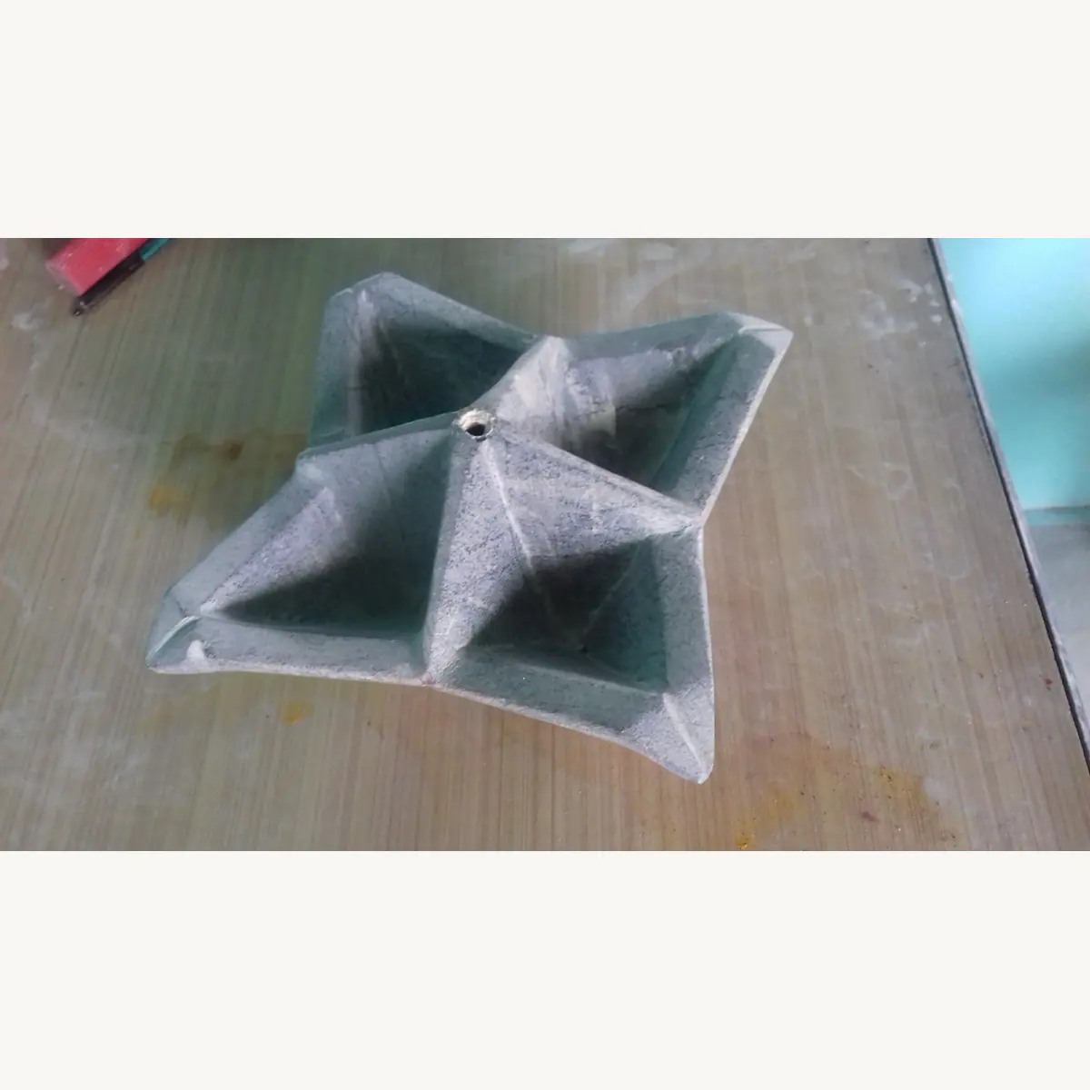 Geometric stone tray carved with four separate sections