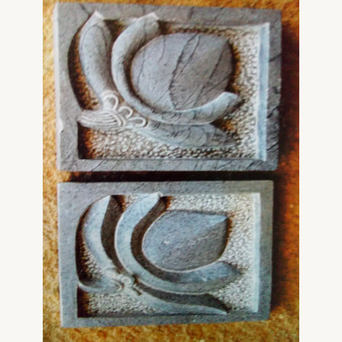 Stone relief panels with carved lotus flowers