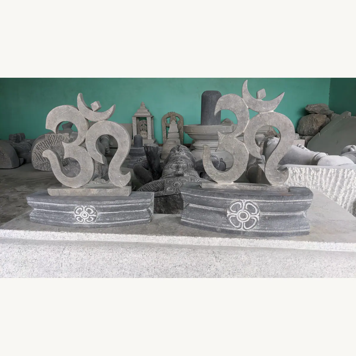 Hand-carved OM stone decor with display bases
