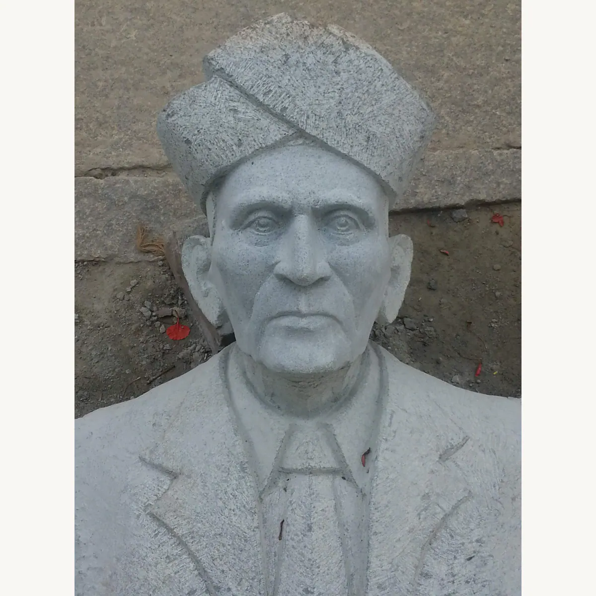 Sir M. Visvesvaraya stone portrait bust with a turban and formal coat in the workshop
